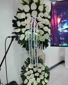 Anthuriums, lilies & orchids Arrangement